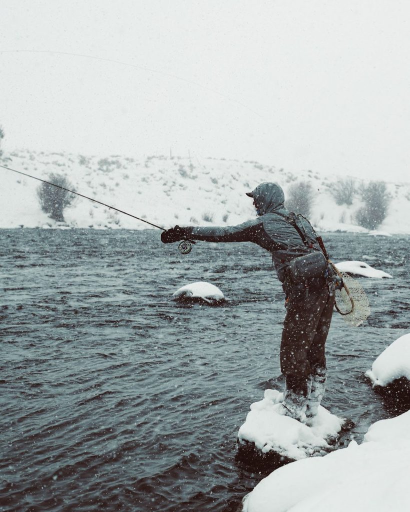 fly fishing in snow with rubber wading boots